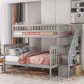 Letto a castello con letto singolo sopra e matrimoniale sotto, scala contenitore